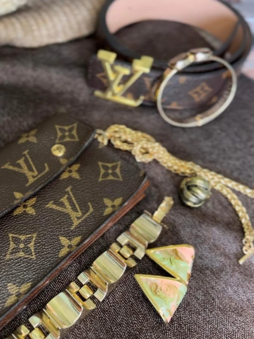 Louis Vuitton Monogram Canvas Accordion Clutch in Brown with Gold Accents